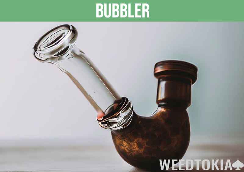 Bubbler device with a water chamber for smoking weed