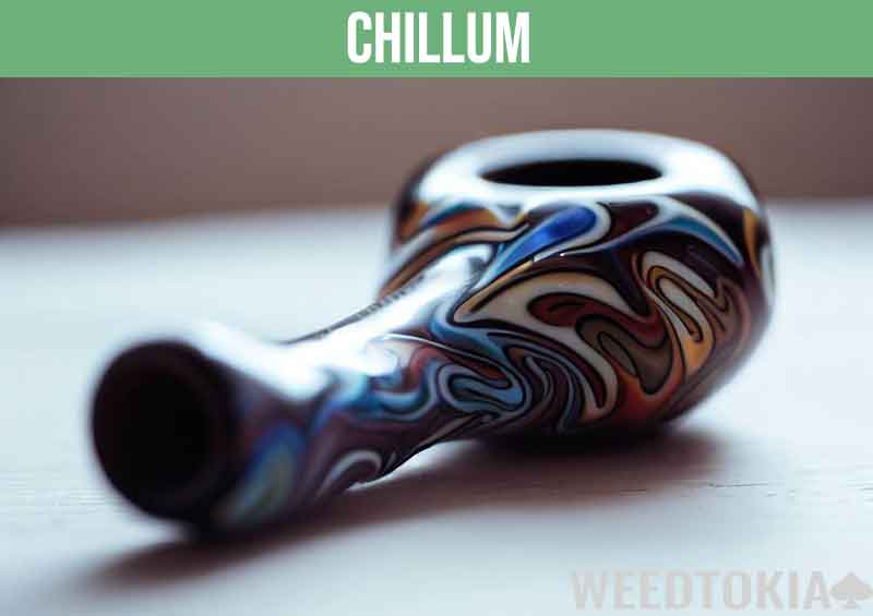 Colorful Chillum resting on a bright table