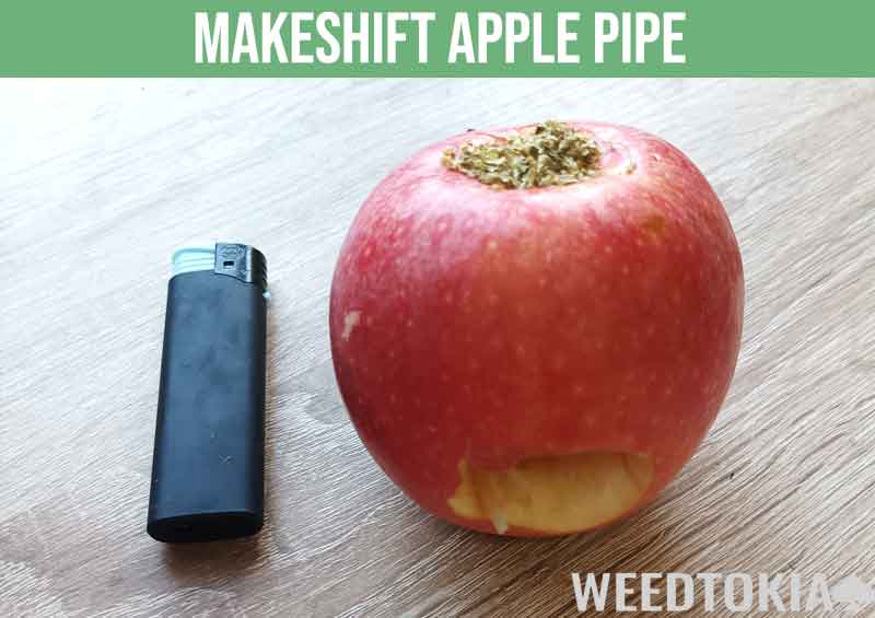 Makeshift apple smoking pipe and lighter