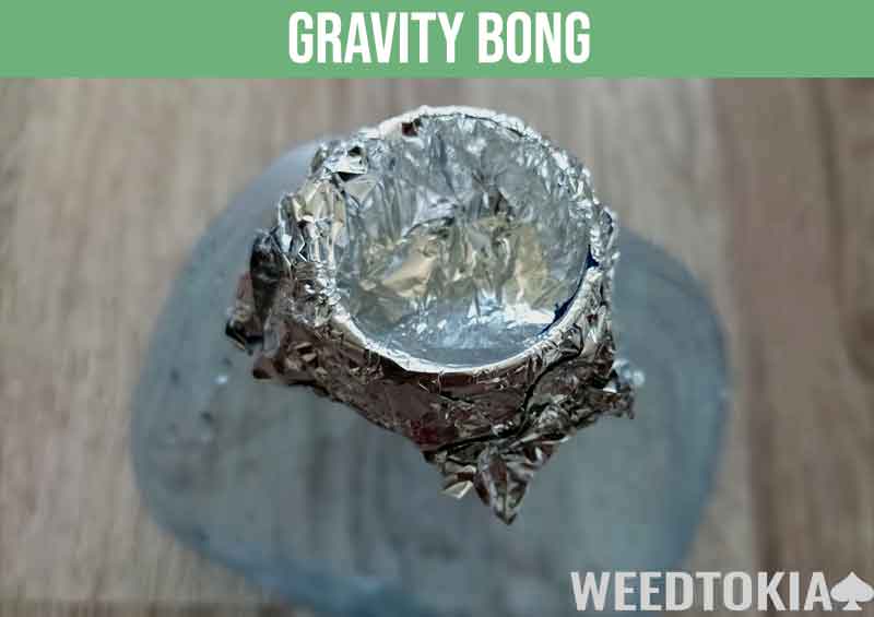 Smoking weed with a gravity bong